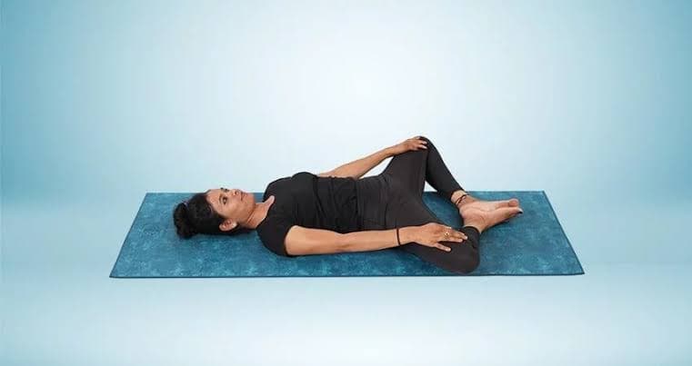 Reclined bound angle pose for anxiety relief